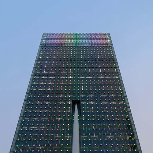 high rise black and multicolored building urban